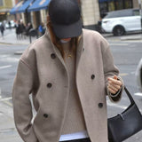 Lang vinterjakke i uld med opretstående krave