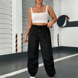 Cargobukser med klaplommer og snøre i siden i taljen