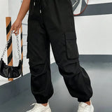 Cargobukser med klaplommer og snøre i siden i taljen