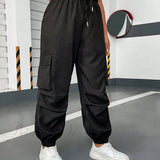 Cargobukser med klaplommer og snøre i siden i taljen