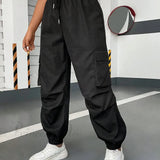 Cargobukser med klaplommer og snøre i siden i taljen