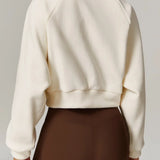 Atletisk fleece yogajakke med opretstående krave og lynlås