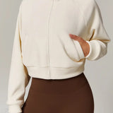 Atletisk fleece yogajakke med opretstående krave og lynlås