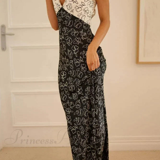 Kjole med blomsterprint, V-hals, kontrastdetaljer og snørebånd i ryggen