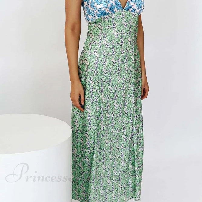 Kjole med blomsterprint, V-hals, kontrastdetaljer og snørebånd i ryggen