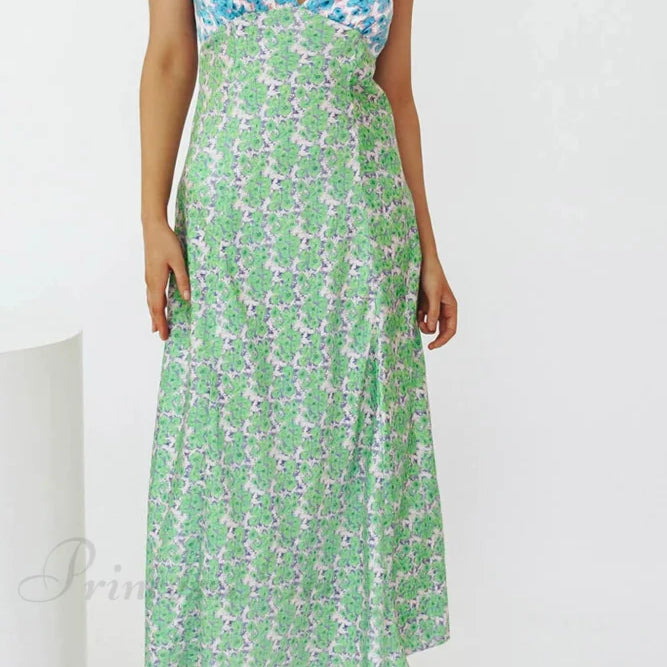 Kjole med blomsterprint, V-hals, kontrastdetaljer og snørebånd i ryggen