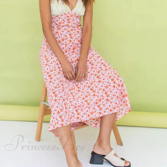 Kjole med blomsterprint, V-hals, kontrastdetaljer og snørebånd i ryggen