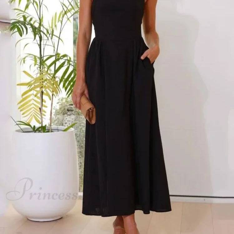 Elegant sort midikjole med halterneck og lav talje