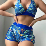 Todelt bikinisæt med printede shorts og et rygløst design