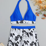 Todelt bikinisæt med printede shorts og et rygløst design