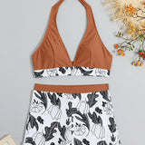 Todelt bikinisæt med printede shorts og et rygløst design