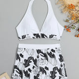 Todelt bikinisæt med printede shorts og et rygløst design