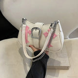 Skuldertaske i kanvas med metalspænde