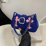 Skuldertaske i kanvas med metalspænde