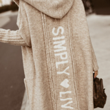 Lang damefrakke – Afslappet pasform – Strikket uld – Hætte – Grafisk ryg