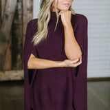 Dameponcho – Uldstrik – Løs pasform – Rullekrave – Vide ærmer