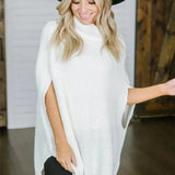 Dameponcho – Uldstrik – Løs pasform – Rullekrave – Vide ærmer