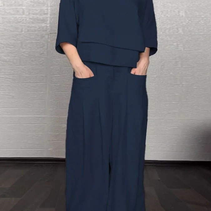 Dame casual outfit – Oversized top med v-hals – Højtaljede bukser med vide ben – Bomuld og hør