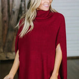 Dameponcho – Uldstrik – Løs pasform – Rullekrave – Vide ærmer