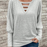 Dametop med lange ærmer – Blød strik – Løs pasform – Elegant åben V-hals