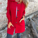 Mellemlang damefrakke – Blød uld – Lige snit – Spændelukning – Store lommer