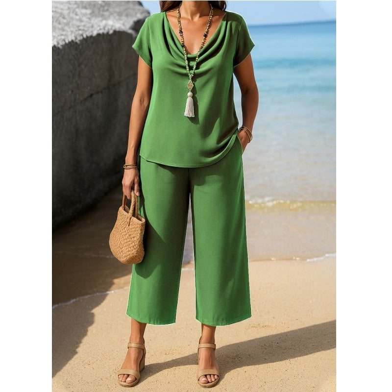 Damesæt – Kortærmet top med draperet krave – Højtaljede bukser med vide ben