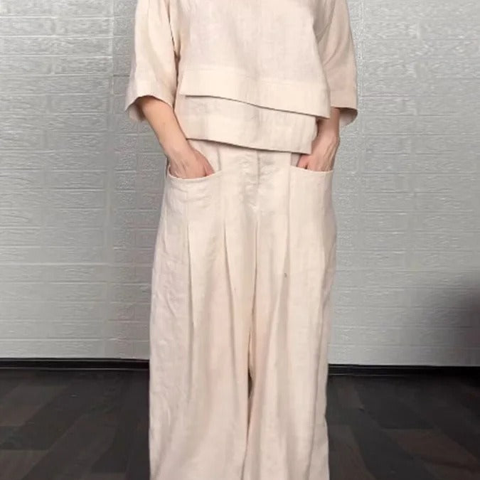 Dame casual outfit – Oversized top med v-hals – Højtaljede bukser med vide ben – Bomuld og hør