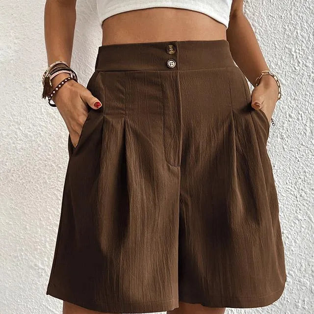 Dameshorts - Høj talje - Løs, flagrende pasform - Elegante knapper - Med lommer