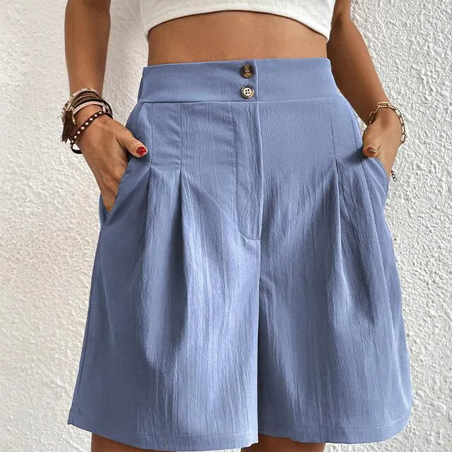 Dameshorts - Høj talje - Løs, flagrende pasform - Elegante knapper - Med lommer