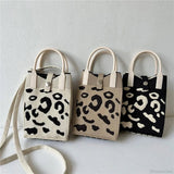 Mini strikket crossbody-taske til mobiltelefon