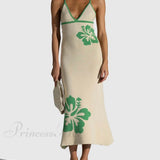 Sexet midikjole med mesh-stropper, åben ryg og V-hals