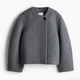 Lammeuldsfrakke med revers og lange ærmer