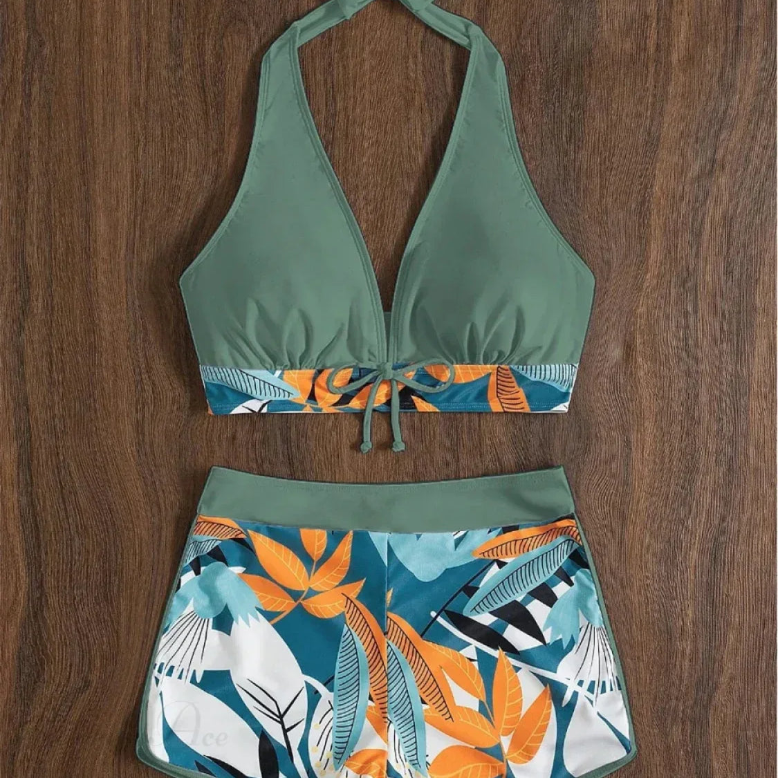 Todelt sæt med åben ryg og knudret bladprint