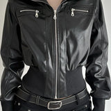 Mørk utilityjakke med læder og patchworklommer