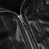 Mørk utilityjakke med læder og patchworklommer