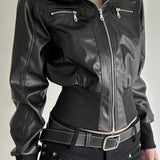 Mørk utilityjakke med læder og patchworklommer