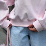 Løstsiddende, afslappet sweatshirt med halv lynlås og broderede bogstaver