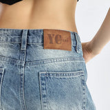 Lavtaljede, gulvlange bootcut-jeans