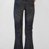 Lavtaljede, svajerformede, falmede slim jeans