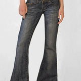 Lavtaljede, svajerformede, falmede slim jeans