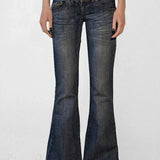 Lavtaljede, svajerformede, falmede slim jeans