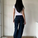 Vide, afslappede jeans med minimalistisk broderi på lommerne