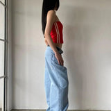 Vide, afslappede jeans med minimalistisk broderi på lommerne