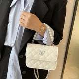 Skuldertaske i PU-læder med perler, tote-stil.