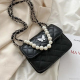 Skuldertaske i PU-læder med perler, tote-stil.