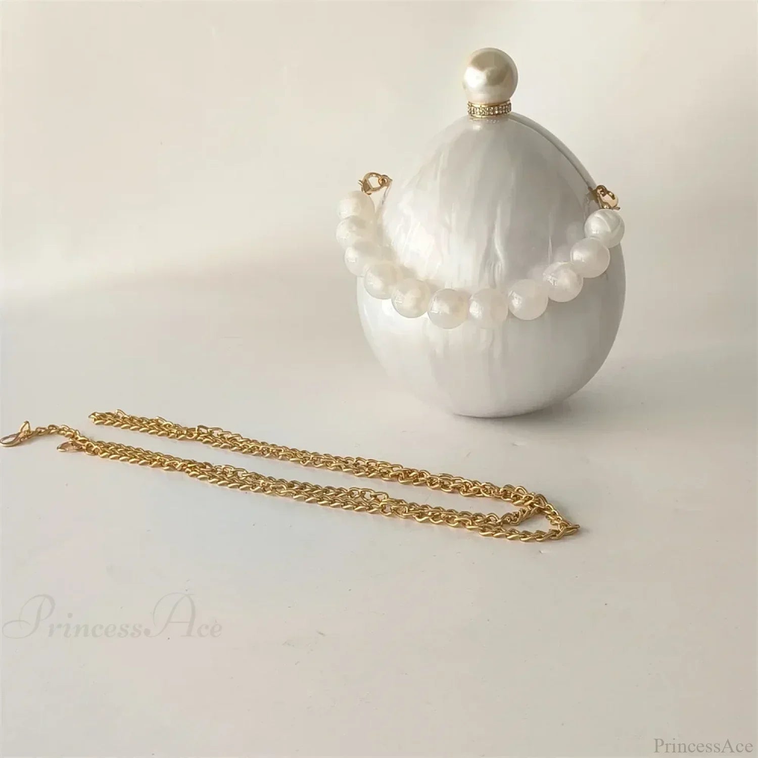 Oval brudeclutch i perlehvid akryl, æggeformet æske, messenger taske