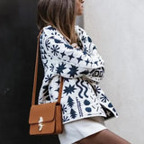 Trykt bomuldsfrakke med enkeltradet lukning og rund hals