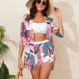 Højtaljet monokinisæt med print og to dele