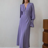 Vintage maxikjole med figursyet pasform og pufærmer og V-hals