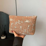 Armbånd i rattan og strå